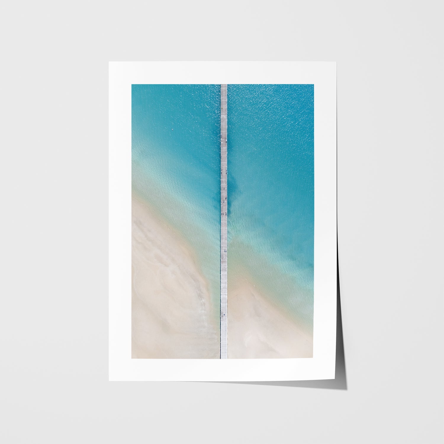 Shallow ocean waves splitting apart in white frame - coastal seascape wall art
