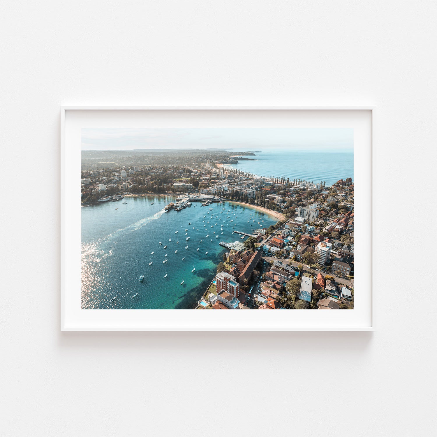 East Manly aerial beach view in white frame - coastal landscape photography wall art