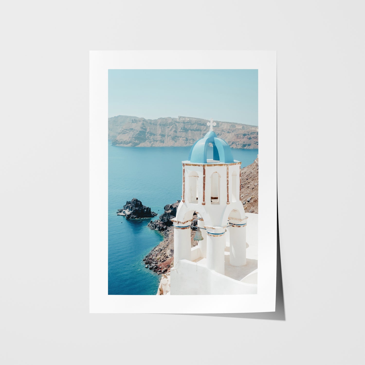 Santorini blue dome architectural photograph in white frame - Mediterranean coastal wall