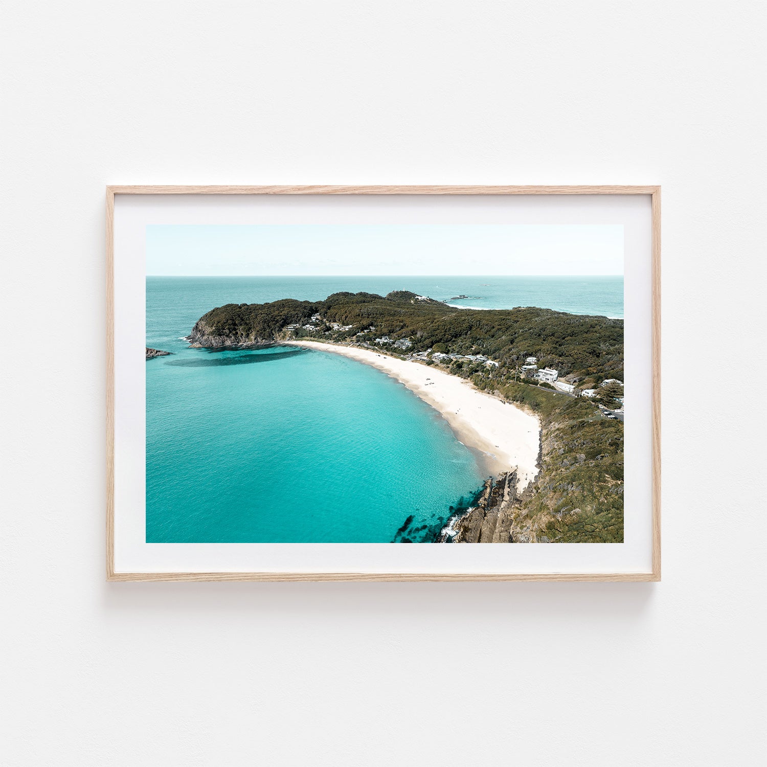 Wooden boat on sandy beach landscape in oak frame - coastal seascape wall art