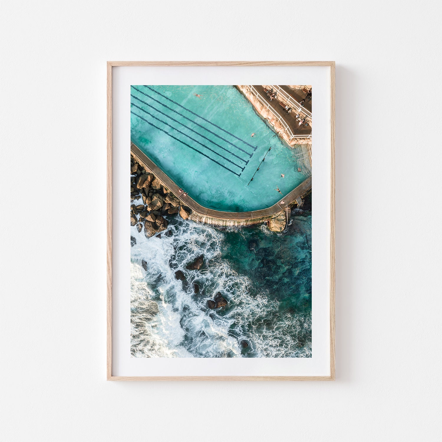 Bronte Beach early morning swimmers aerial view - framed coastal photography in oak frame