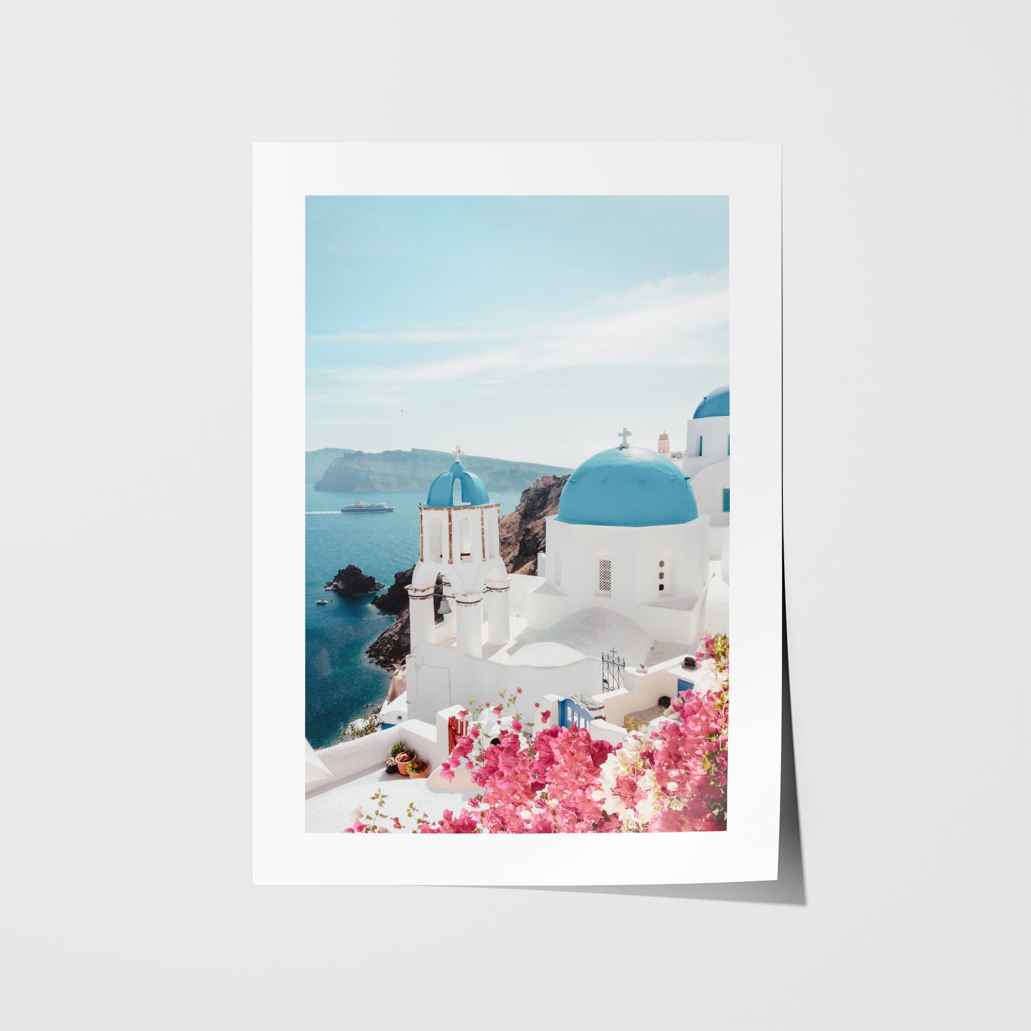 Santorini's colorful coastal buildings in white frame - Mediterranean landscape wall art