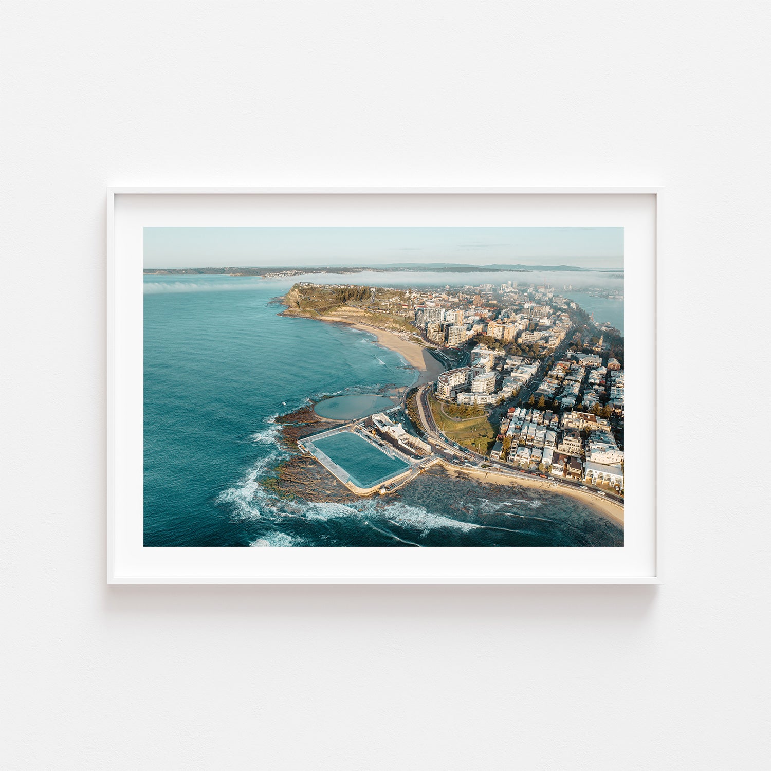 Foggy Newcastle cityscape in white frame - moody coastal photography wall art