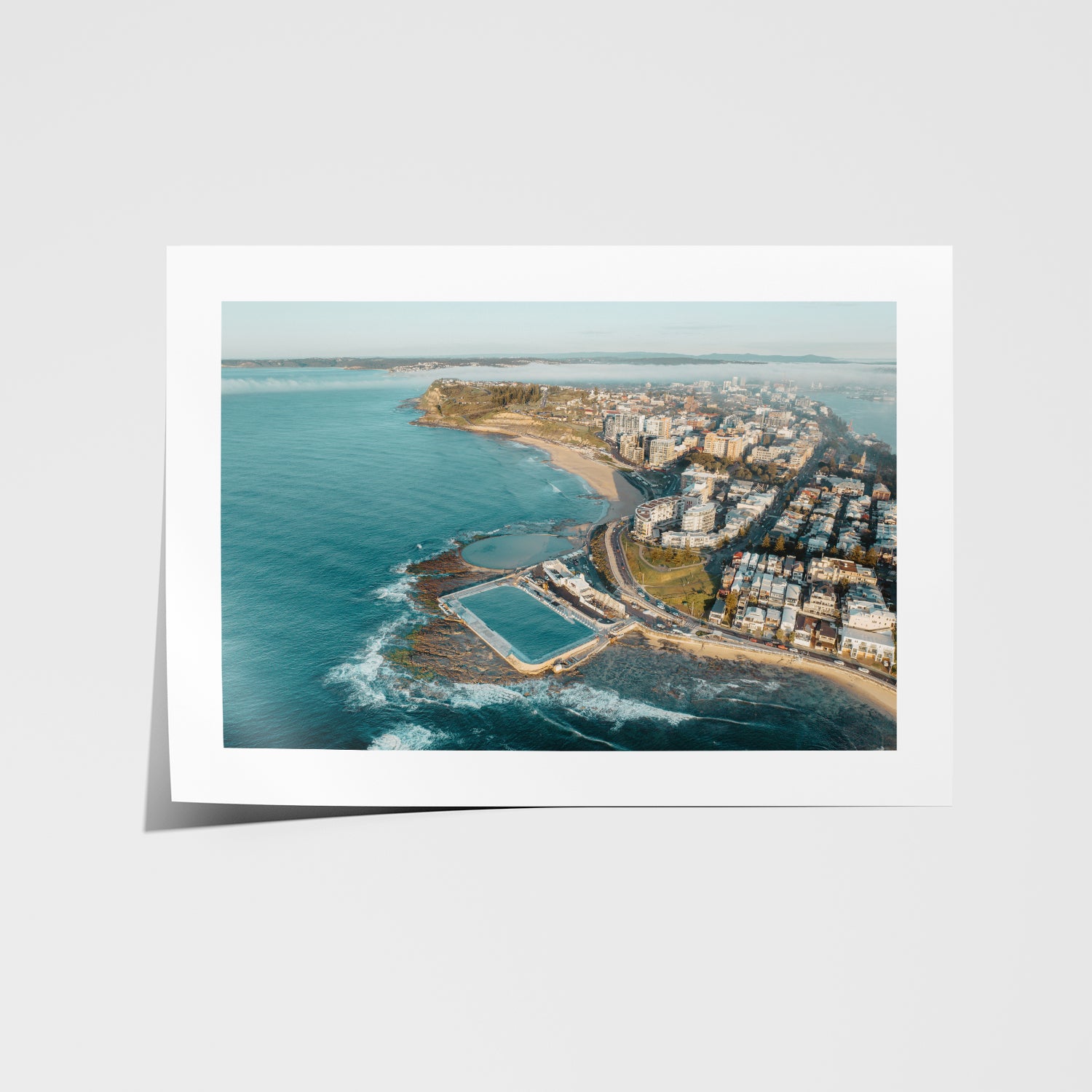Fog rolling over Newcastle harbour in white frame - moody coastal photography wall art