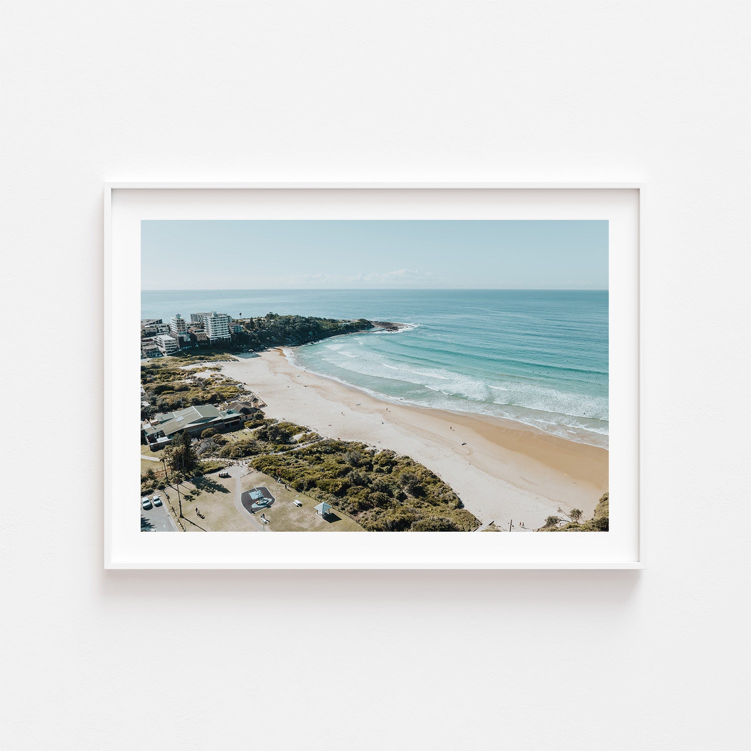 Freshwater Beach aerial swimming scene in white frame - Australian coastal wall art