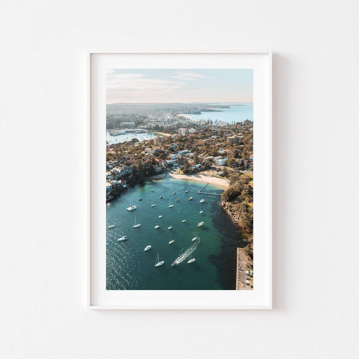 Little Manly Beach aerial seascape in white frame - Sydney coastal photography wall art