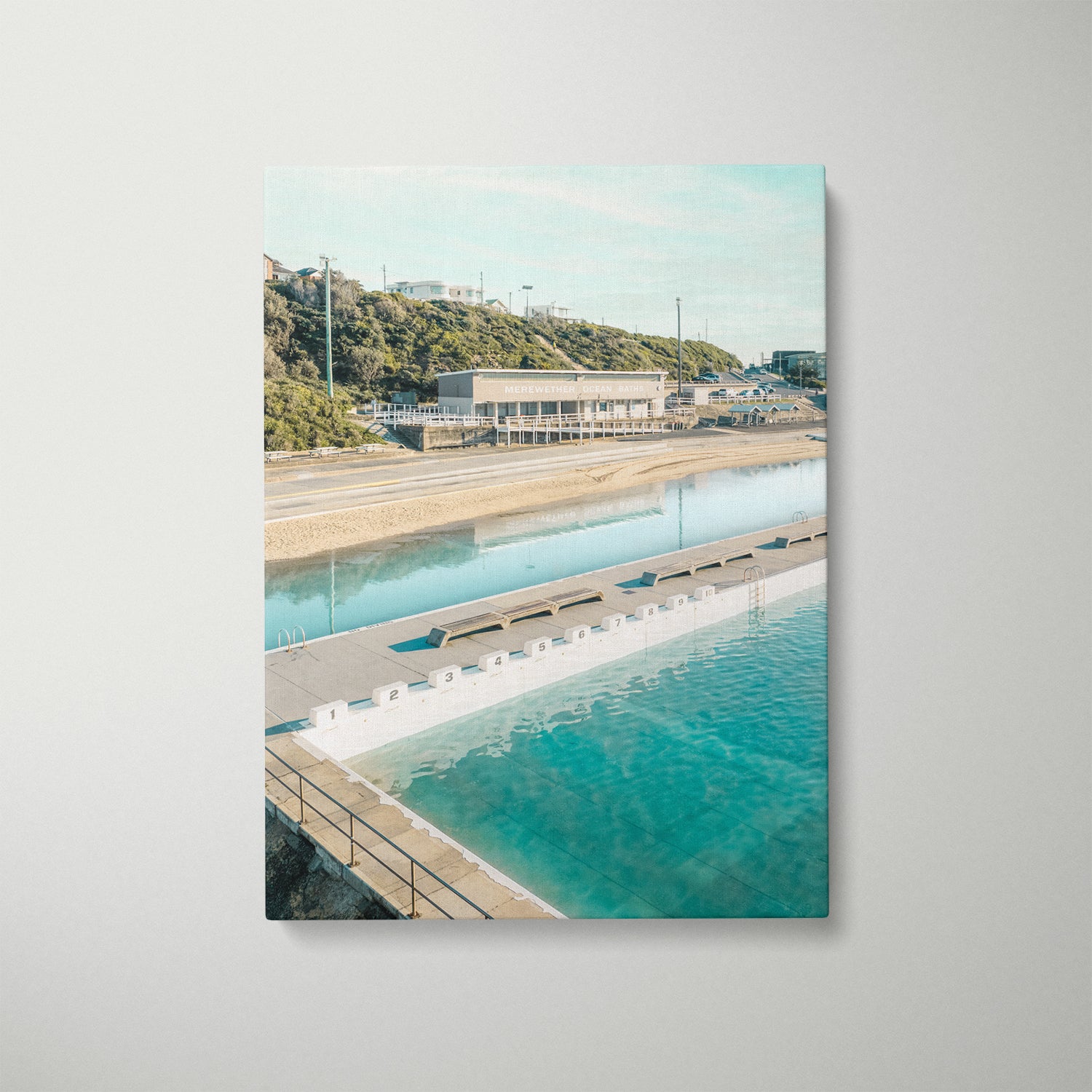 Merewether Ocean Baths aerial view in white frame - coastal swimming pool wall art