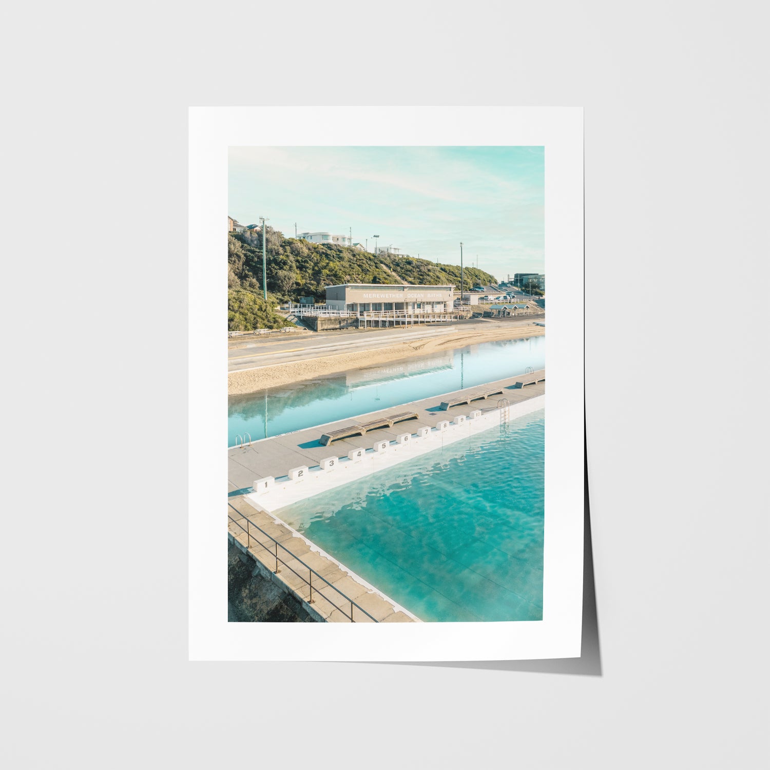 Merewether Ocean Baths aerial view in white frame - coastal swimming pool wall art