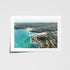 Tamarama swimmers in surf aerial view in white frame - coastal photography wall art