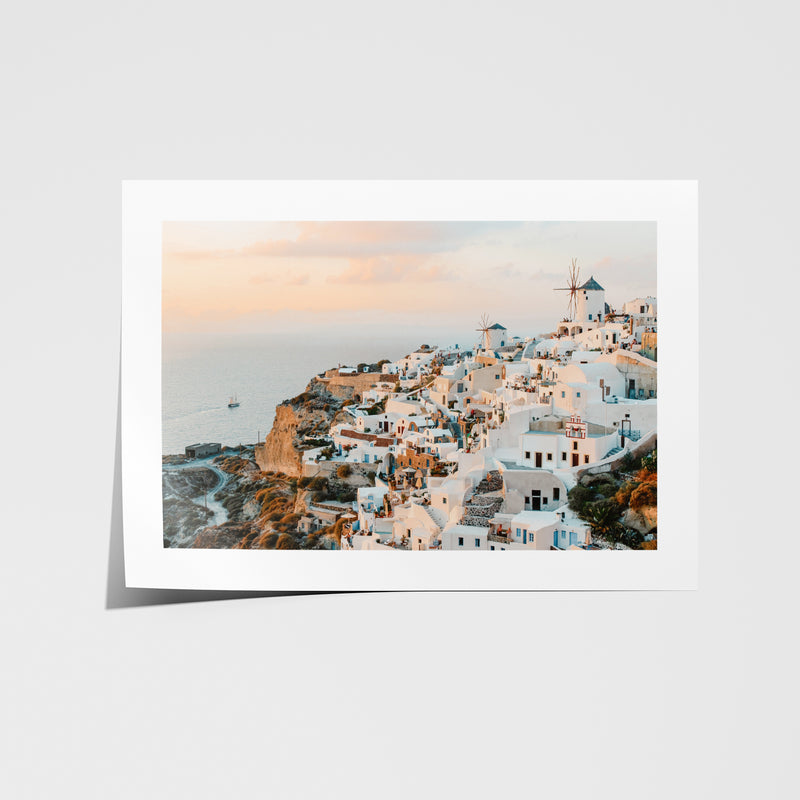 Santorini's Oia village sunset seascape in white frame - Mediterranean coastal wall art