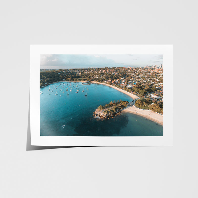 Swim O Clock aerial view of Balmoral Beach pools in black frame - coastal swimming wall