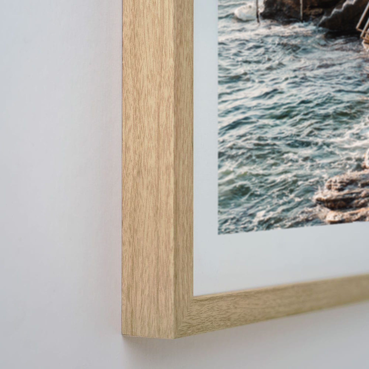 Minimalist coastal scene in oak timber frame - DIY beach photography wall art for modern