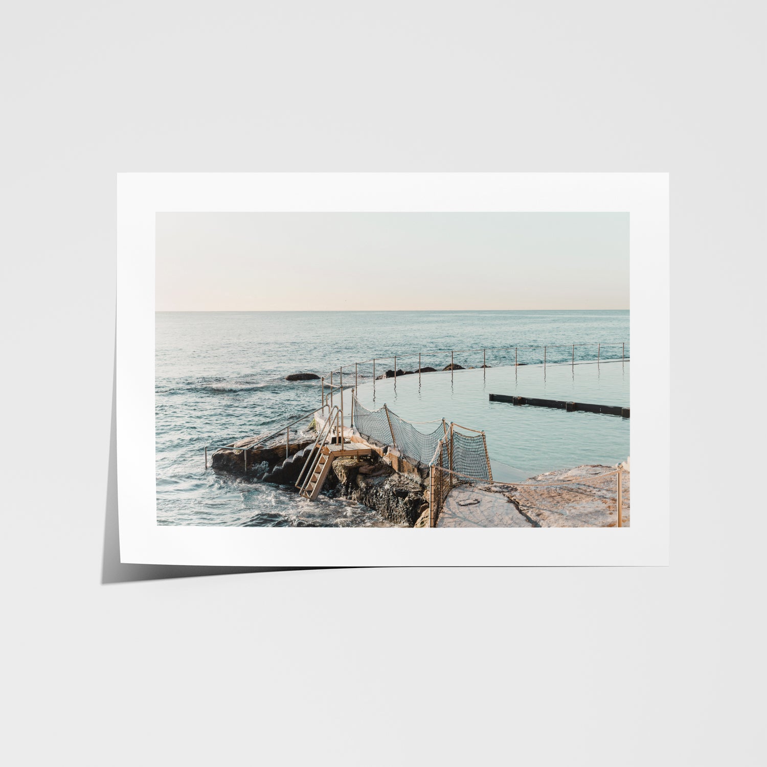 Bronte Beach sun-drenched aerial landscape in white frame - coastal photography wall art