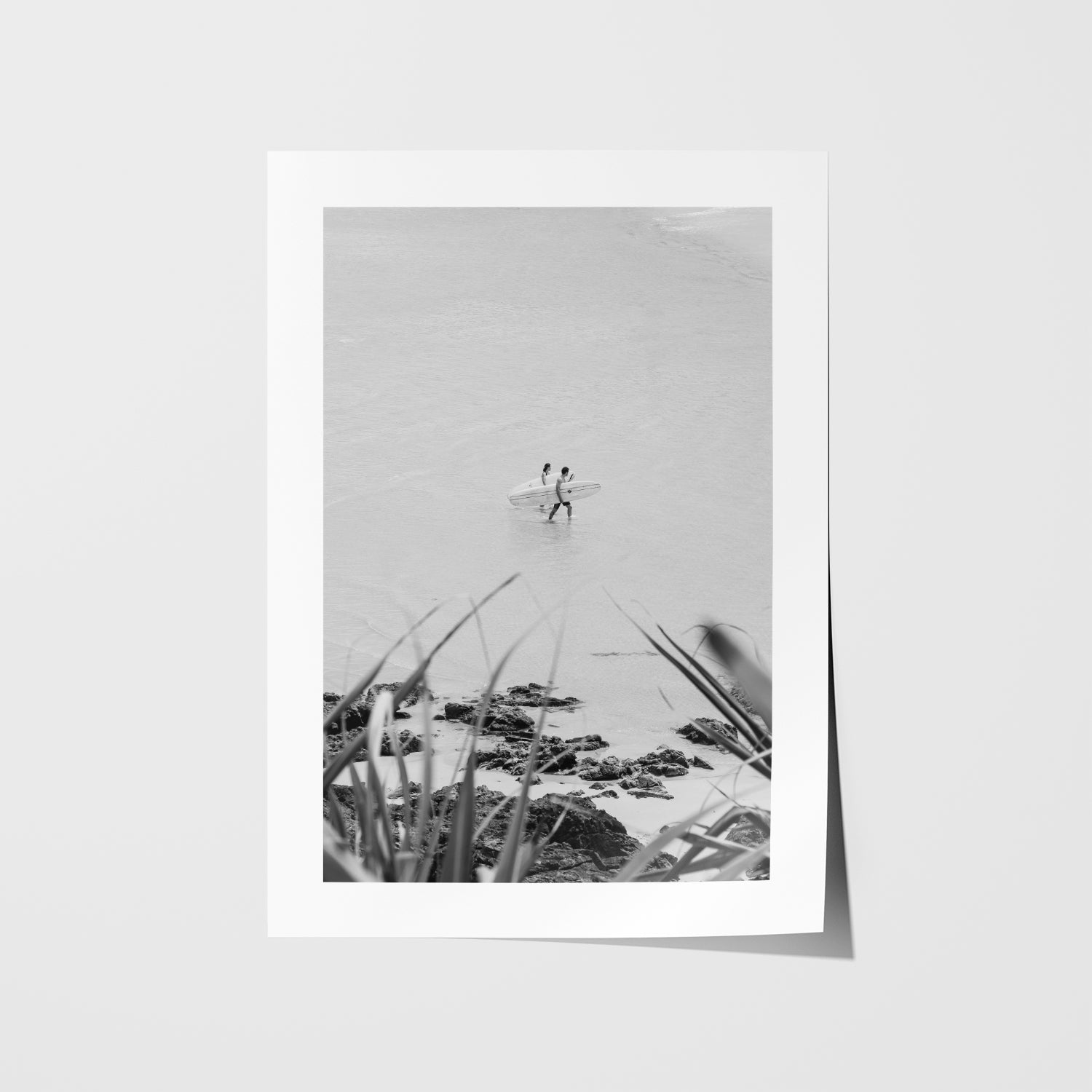 Byron Bay surf partners swimming underwater - ocean photography in white frame