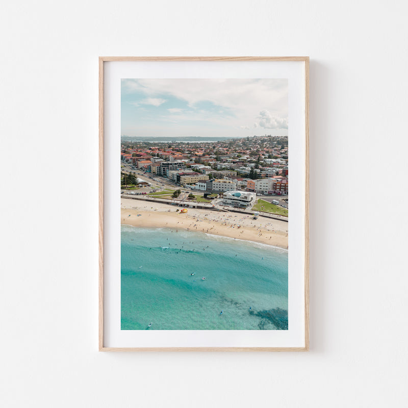 North Bondi Surf Club in a Oak Timber Frame Portrait Art Print by Through Our Lens