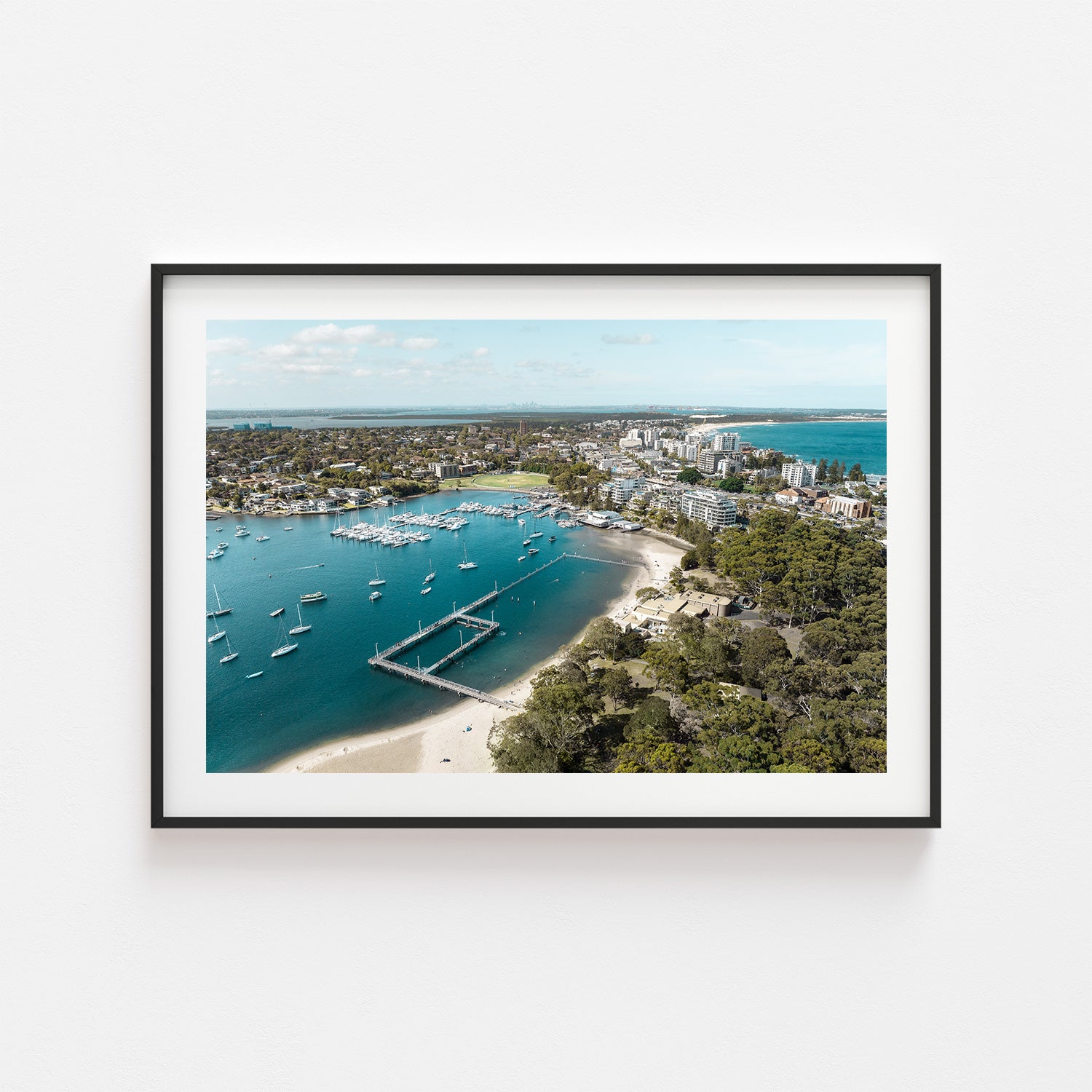 Gunnamatta Bay ocean baths aerial photograph in black frame - coastal swimming pool wall