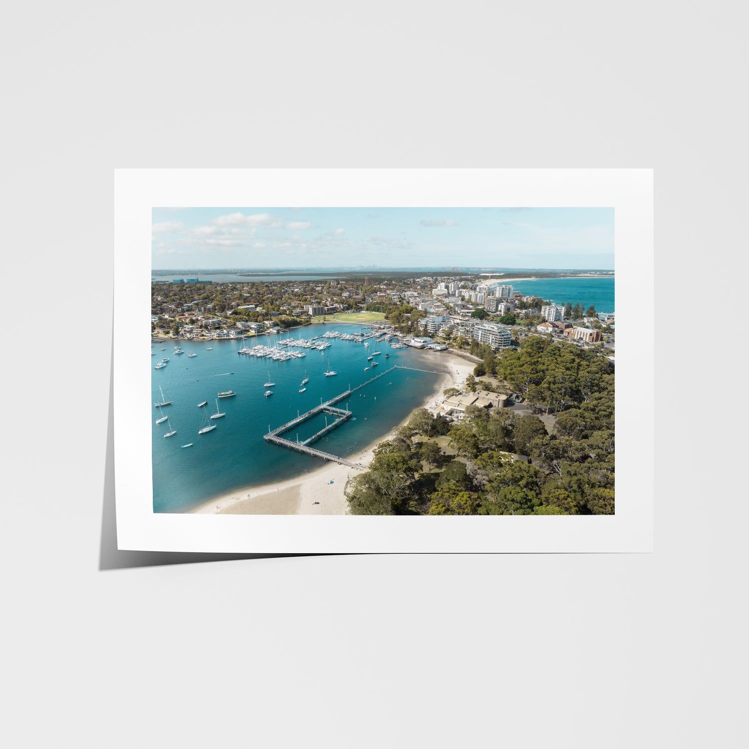 Gunnamatta Bay ocean pool aerial view in white frame - coastal swimming photography wall
