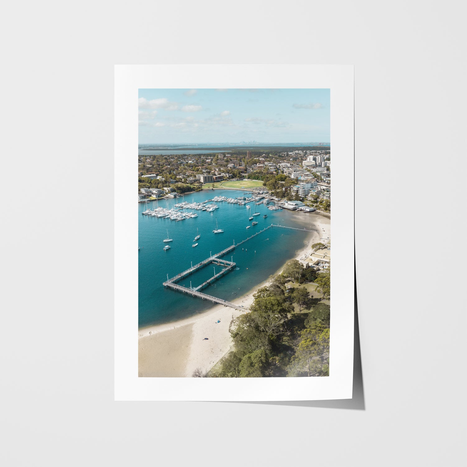 Gunnamatta Bay ocean pool aerial view in white frame - coastal swimming photography wall