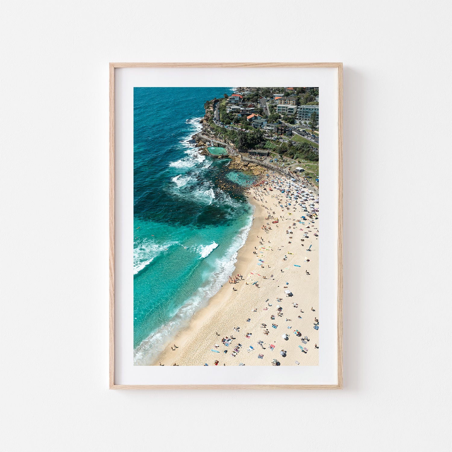 Bronte rock pool swimmers in full swing - aerial photograph in oak frame - coastal wall