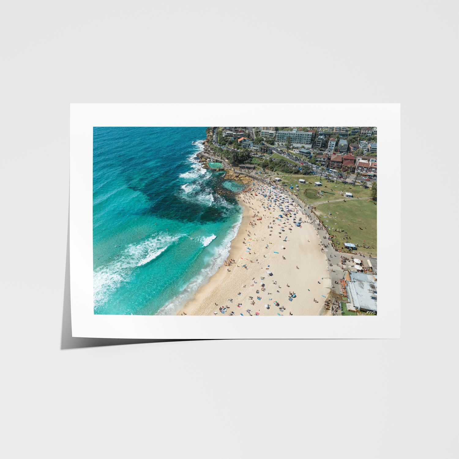 Bronte swimmers in full swing - framed aerial beach photography in white frame for