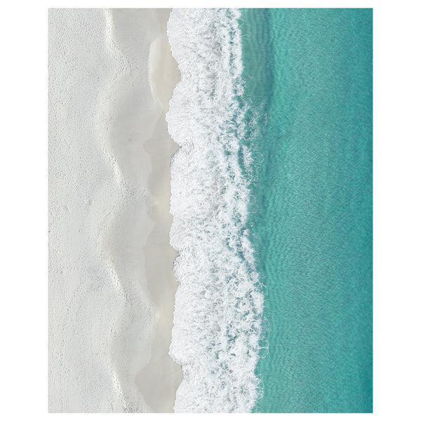 Waves from above with white sand and crystal clear water in Jervis Bay