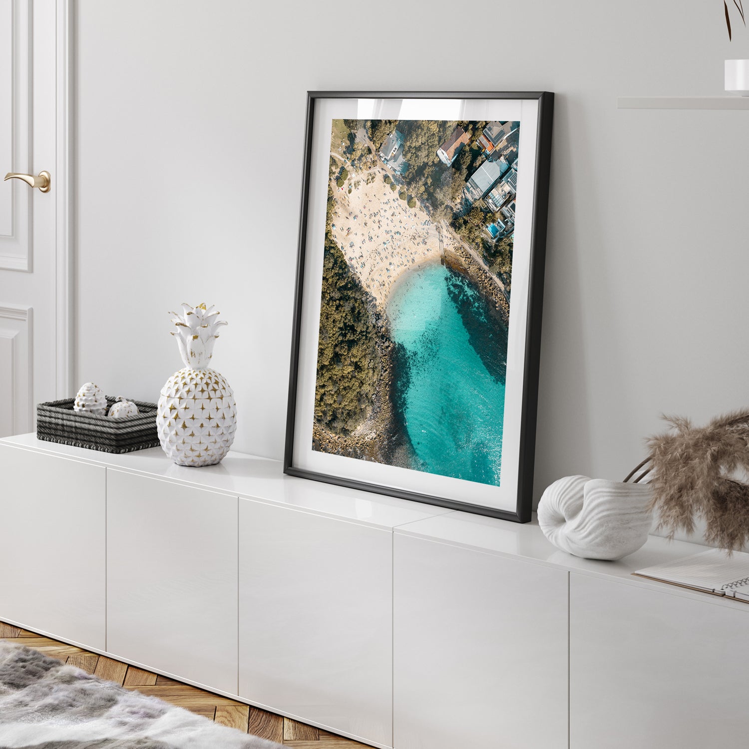Shelly seascape with shells and coastal elements in black frame - beach photography wall