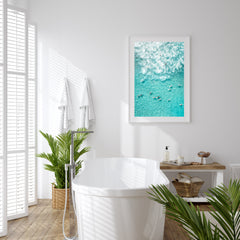 Sydney Surf Abstract Art Print for Coastal Interior in a white frame in a bathroom setting.