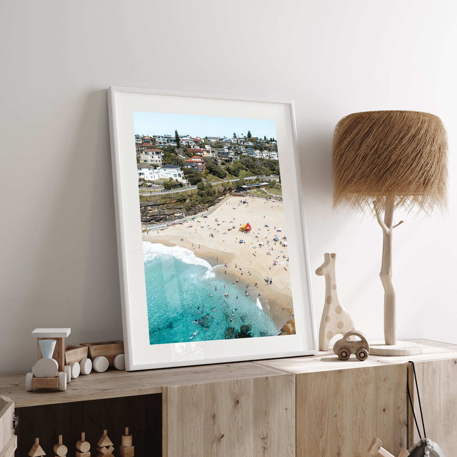 Tamarama Beach aerial view in white frame - Sydney coastal photography wall art